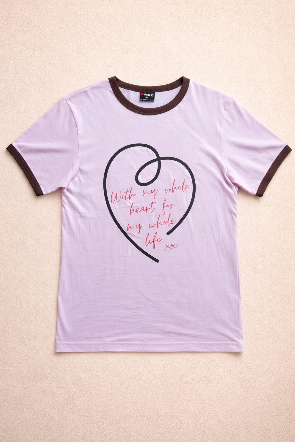 OUR TEE THAT GIVES BACK