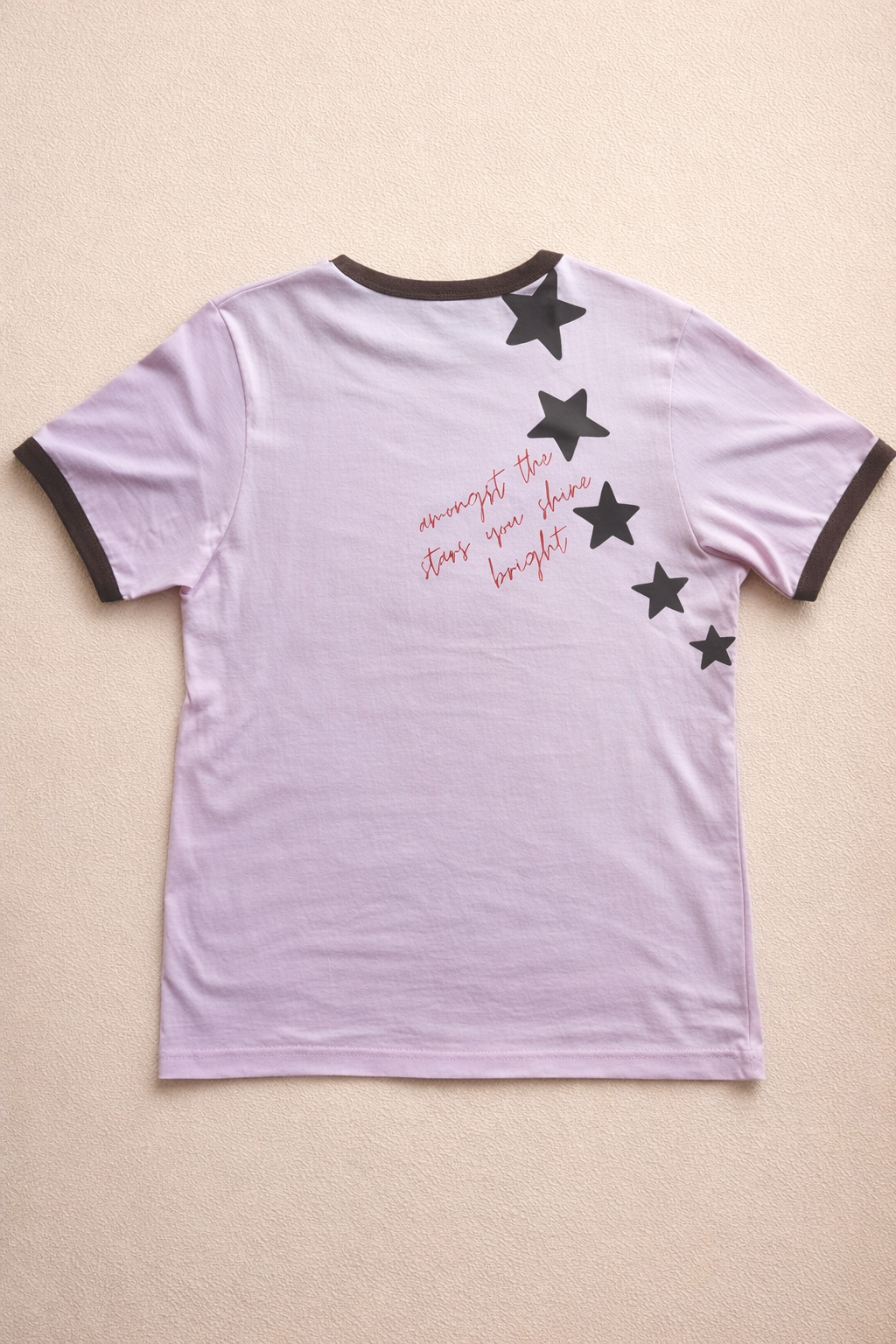 OUR TEE THAT GIVES BACK